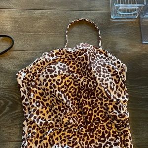 Never worn, one piece